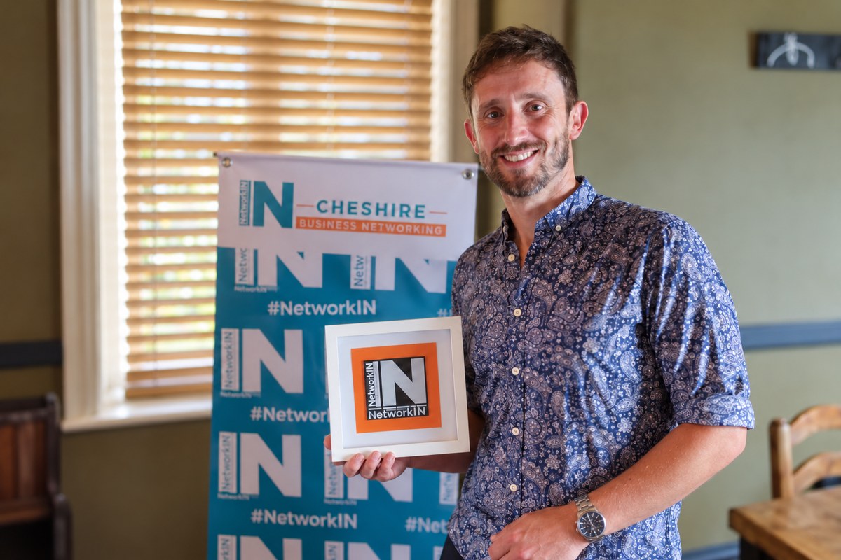 Craig Hancock holding his NetworkIN Networking Minute Maestro award
