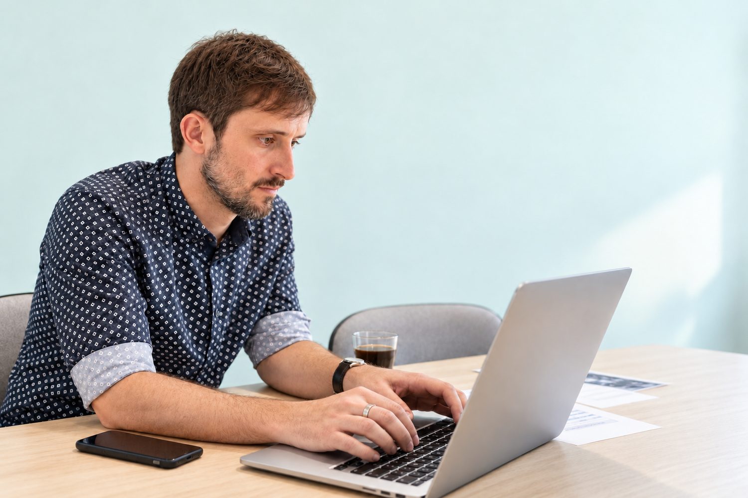 Craig Hancock working at his laptop